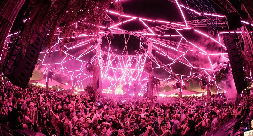 Pink light fills the immersive stage at Polygon Live London