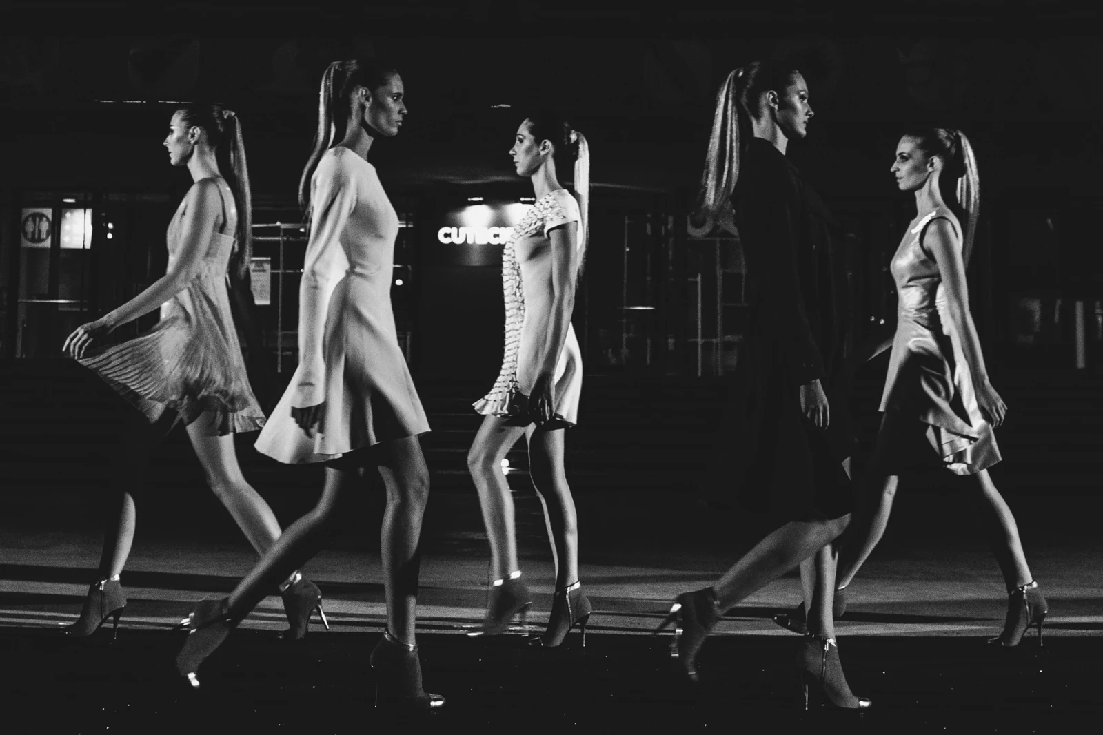 Models crossing the Rome anniversary runway