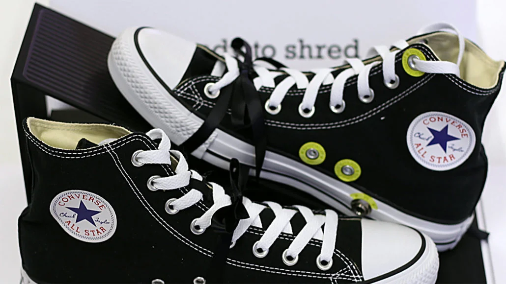 Close-up of the Converse All Wah shoes with illuminated controls