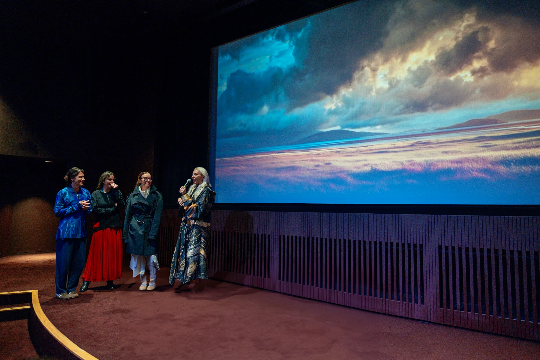 The Storm’s Hebrides landscape fills the screen behind SoundShirt participants at Tate Modern