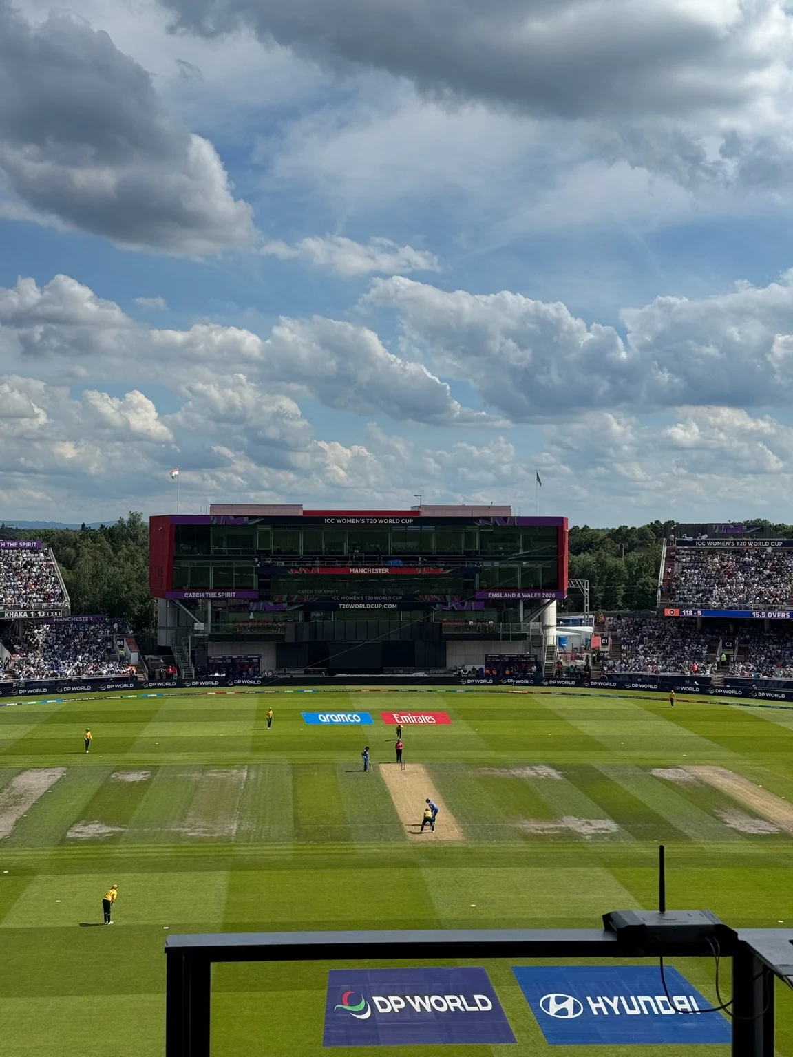 A live cricket match in Manchester, with Hyundai branding beside the pitch